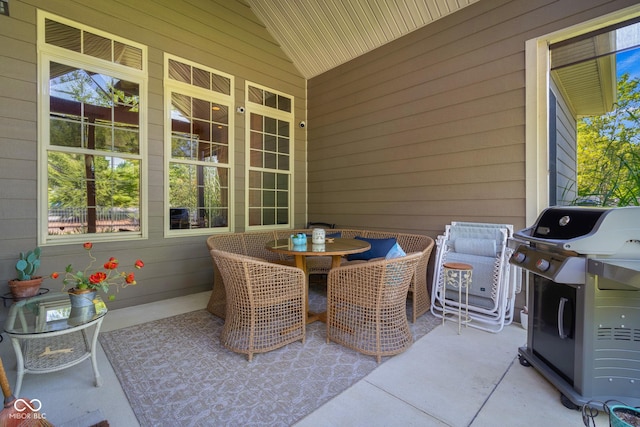 view of patio with a grill