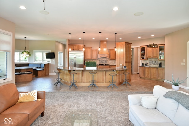 living room featuring light tile patterned floors