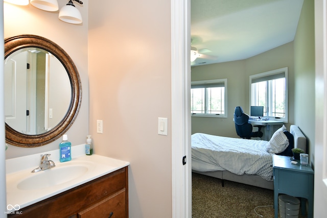 bathroom featuring vanity and ceiling fan