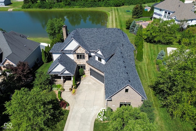 drone / aerial view with a water view