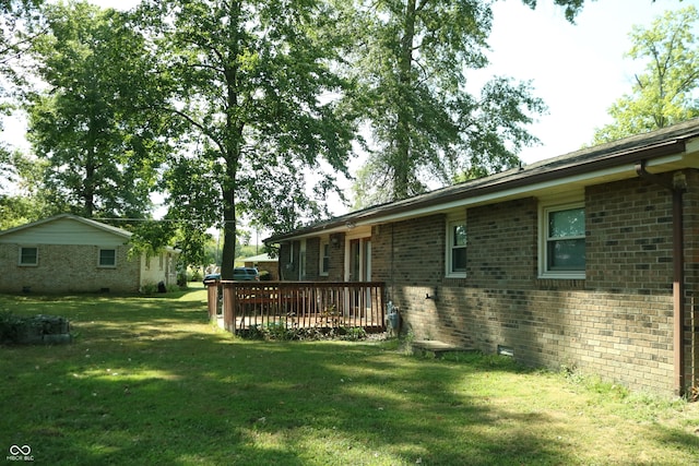 view of yard featuring a deck