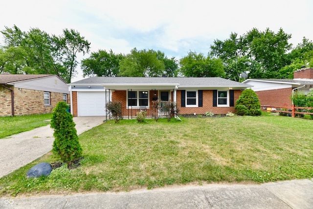 single story home with a garage, covered porch, and a front lawn