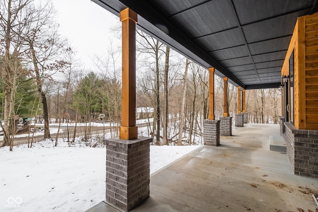 view of snow covered patio