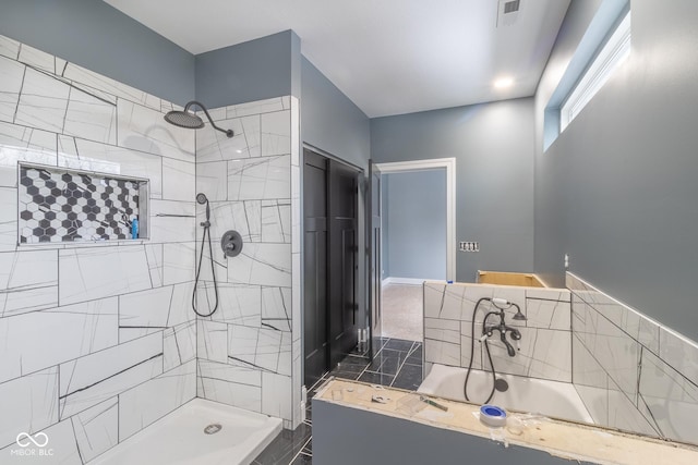 bathroom with tiled shower