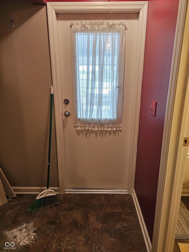 14 Winchester Ct, Anderson, IN 46013 - entryway featuring baseboards and plenty of natural light