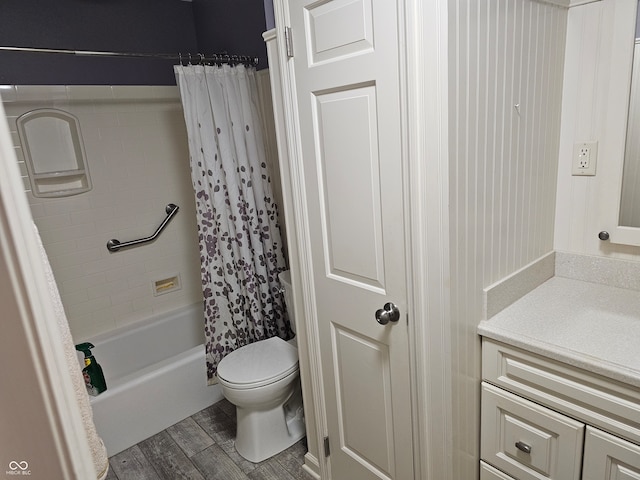 full bathroom with wood-type flooring, vanity, toilet, and shower / bath combination with curtain