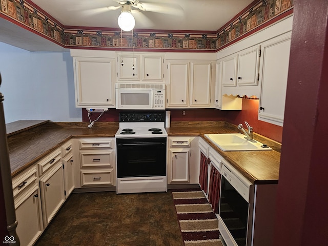 kitchen with white cabinetry, sink, ceiling fan, and electric stove