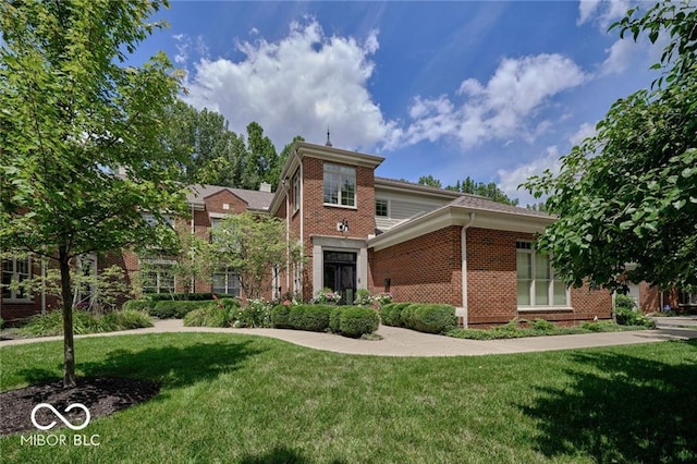 view of property featuring a front yard