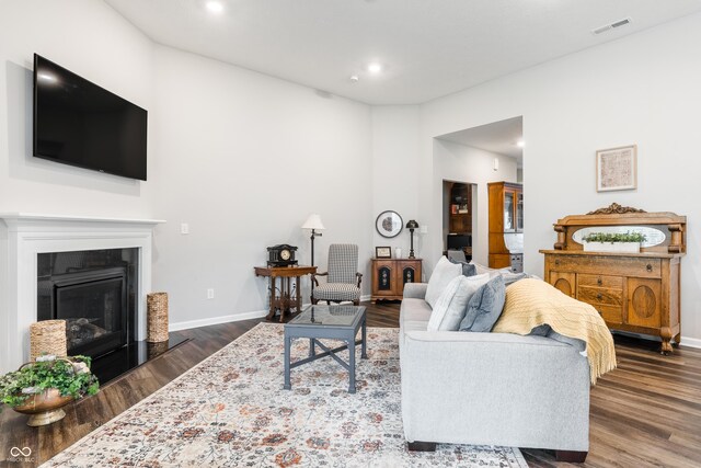 living room featuring dark hardwood / wood-style floors