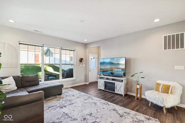 living room with dark wood-type flooring