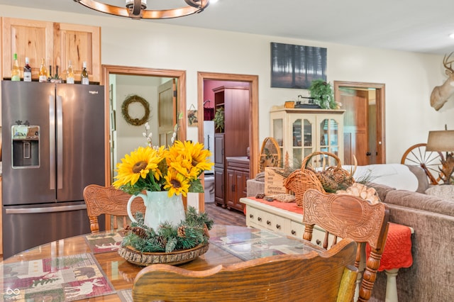 dining room with wood-type flooring