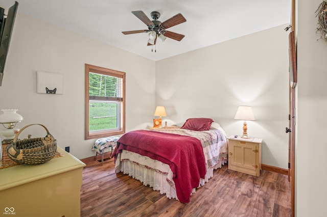 bedroom featuring ceiling fan and hardwood / wood-style flooring