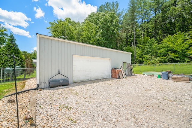 garage with a yard