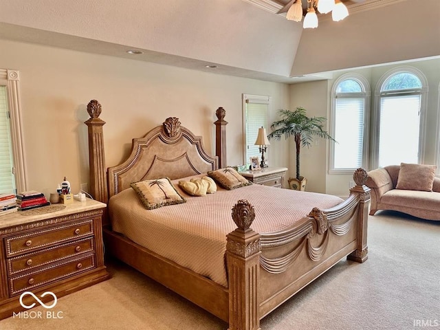 bedroom featuring ceiling fan, light colored carpet, and vaulted ceiling