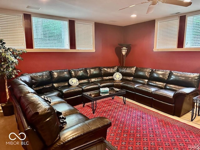 living room featuring ceiling fan