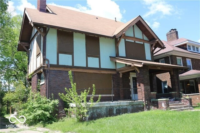 3358 Ruckle St, Indianapolis, IN 46205 - rear view of house with covered porch