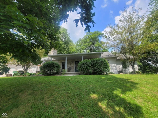 view of front of home with a front yard