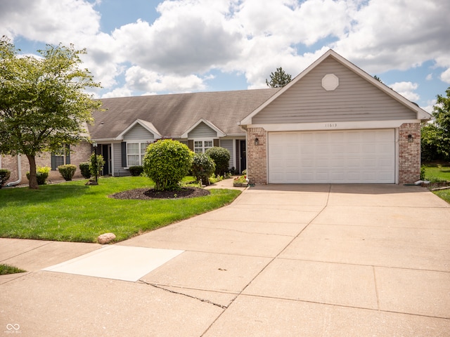 ranch-style home with a garage and a front yard