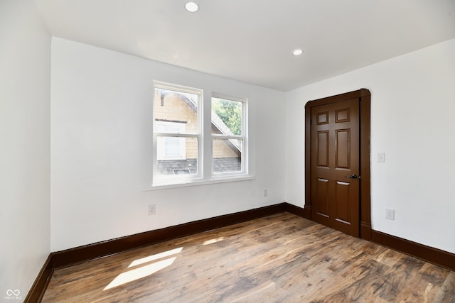 empty room featuring dark hardwood / wood-style floors