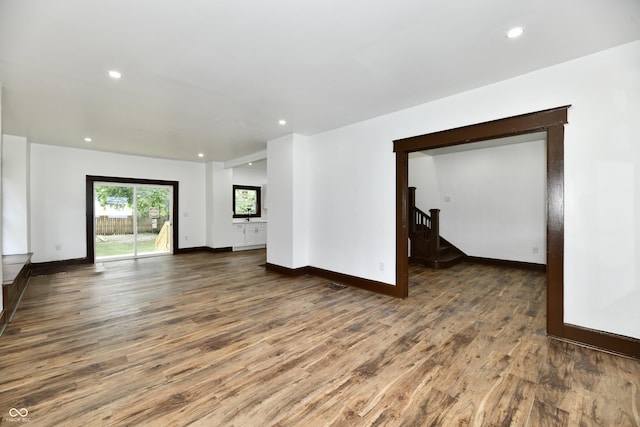 unfurnished room featuring dark hardwood / wood-style floors