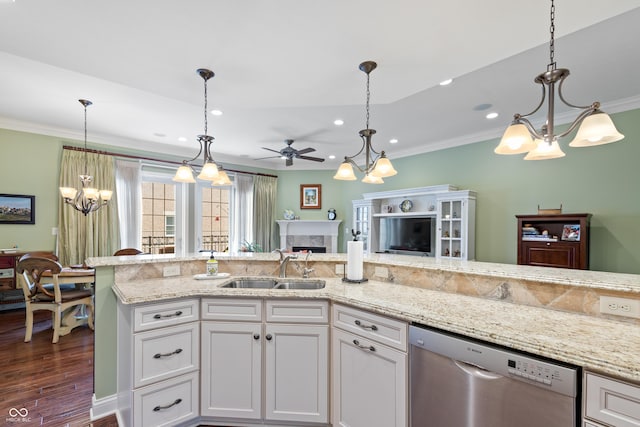 kitchen with white cabinetry, dishwasher, sink, and pendant lighting