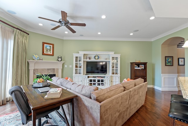 living room featuring crown molding, dark hardwood / wood-style floors, and ceiling fan