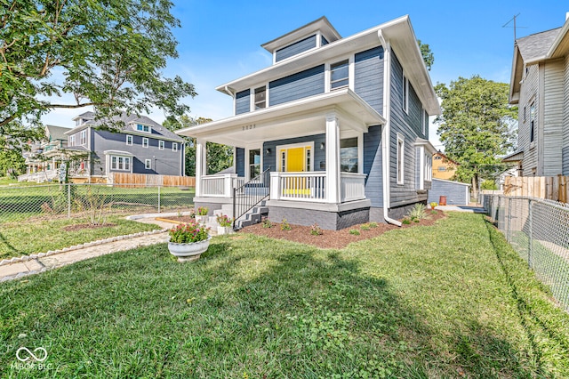 view of front of house featuring a porch and a front yard