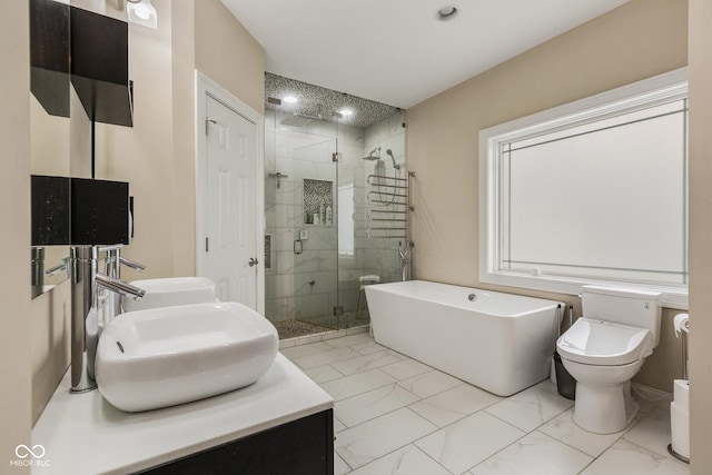 full bathroom with plus walk in shower, vanity, and toilet