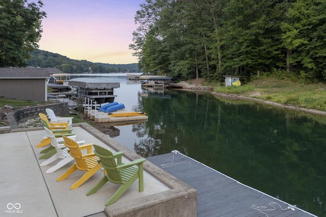 view of dock with a water view