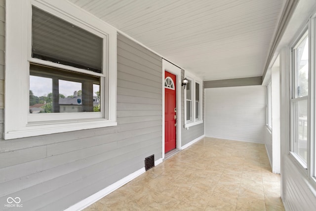 view of unfurnished sunroom