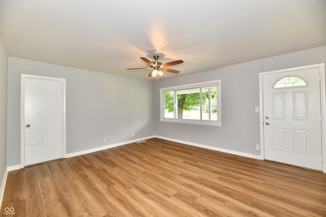 entrance foyer featuring light wood-type flooring and ceiling fan