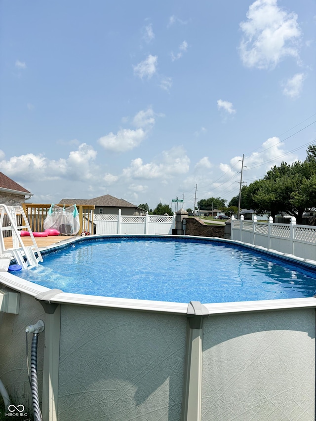 view of pool featuring a fenced in pool and fence