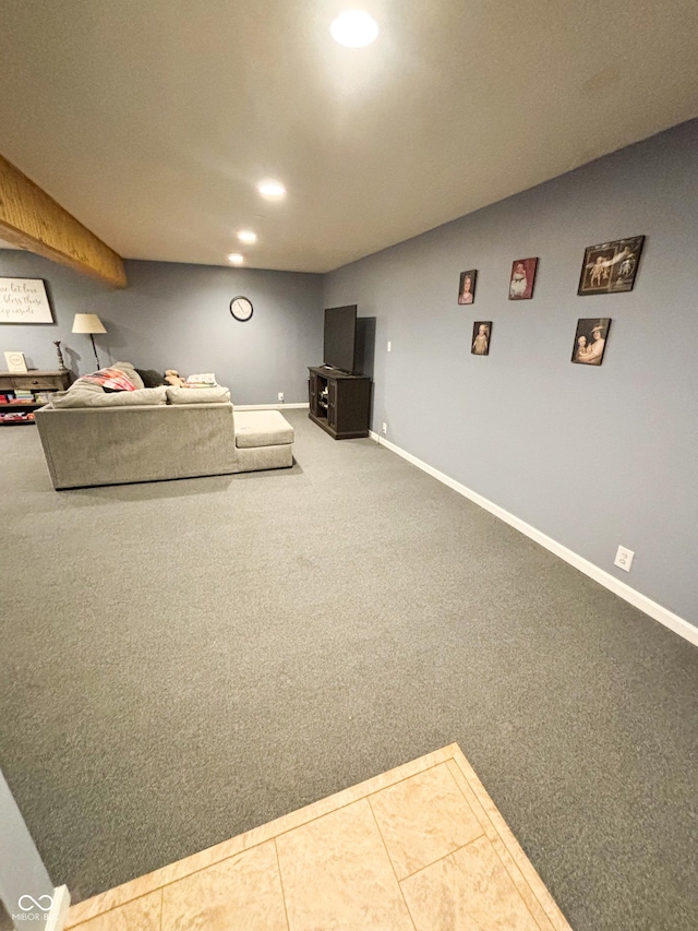 unfurnished living room featuring recessed lighting, tile patterned flooring, carpet flooring, and baseboards