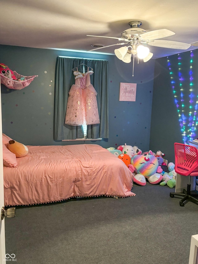 bedroom featuring ceiling fan and carpet floors