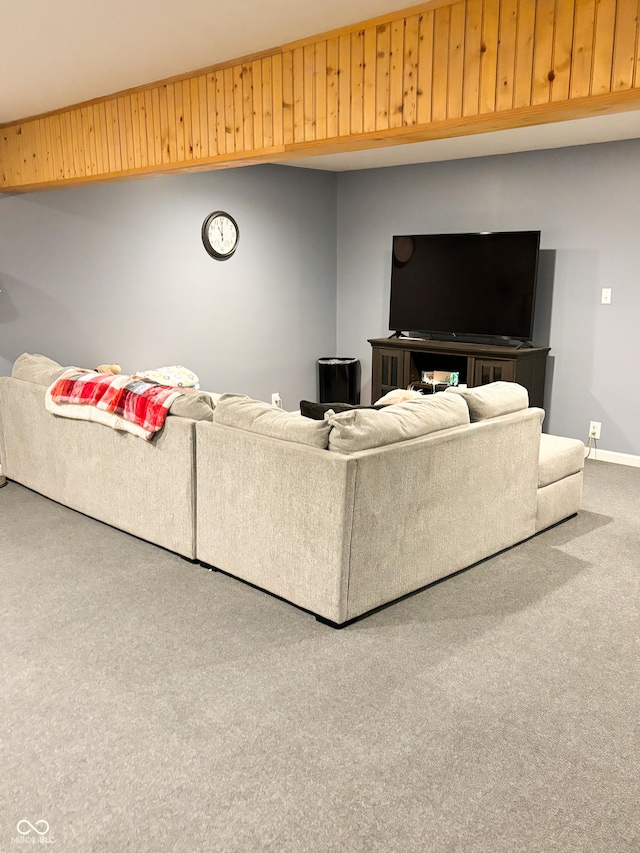 living room with carpet and baseboards