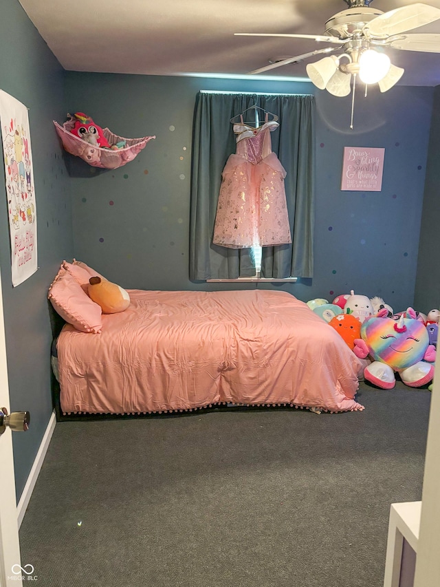 bedroom featuring ceiling fan, baseboards, and carpet flooring