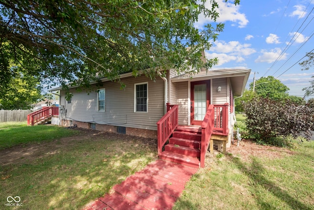 view of front of home with a front yard