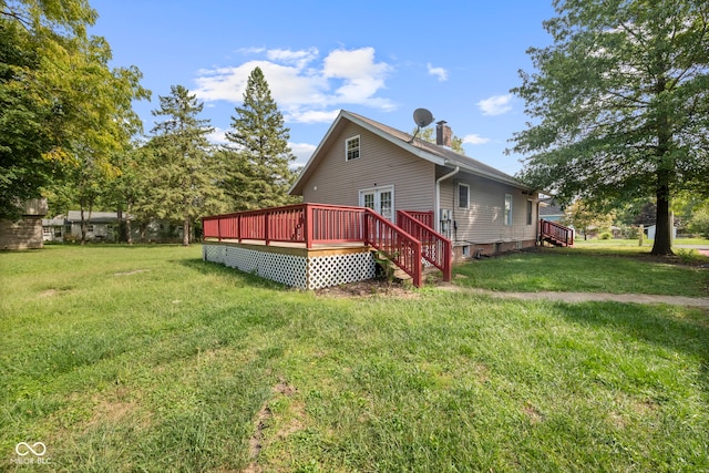 view of property exterior featuring a wooden deck and a yard