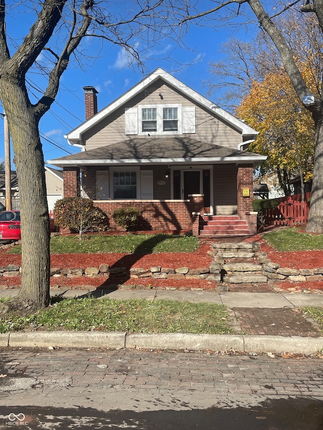 bungalow featuring a porch