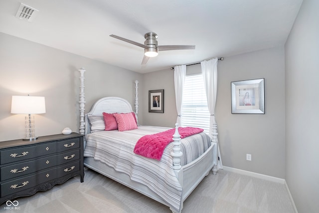 bedroom featuring ceiling fan and light colored carpet