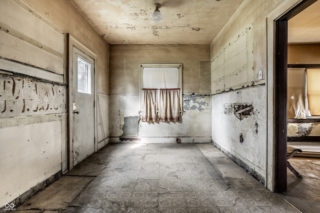 misc room with tile patterned flooring