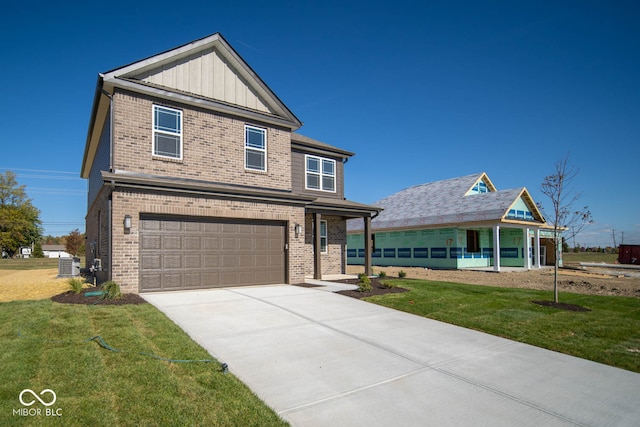 view of front facade with a garage and a front yard