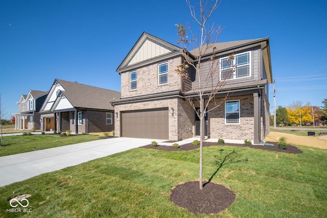 view of front facade with a front yard and a garage