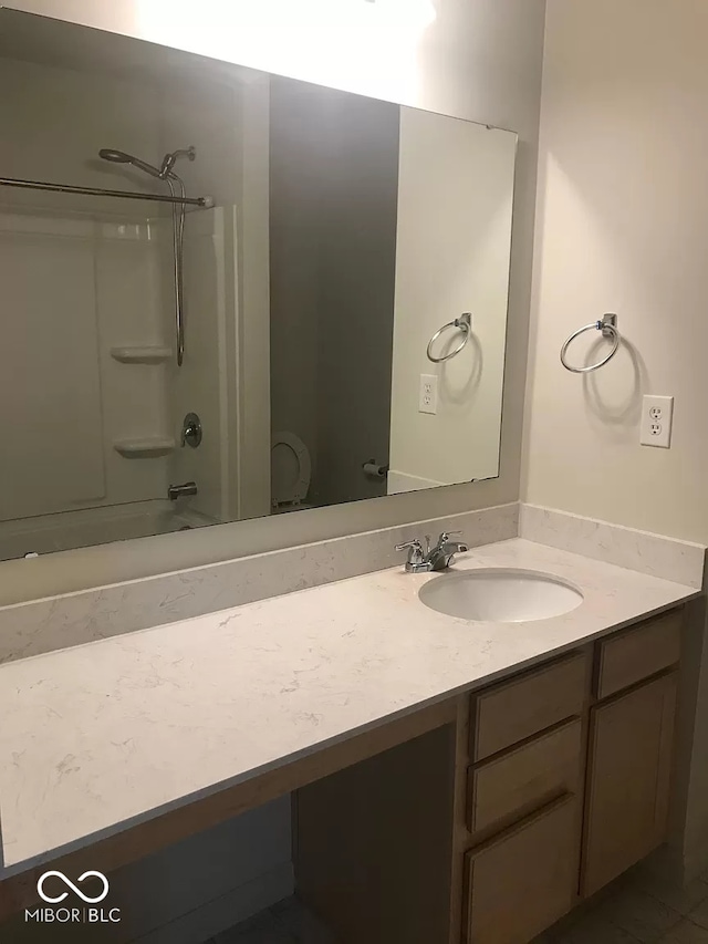 bathroom with  shower combination and vanity