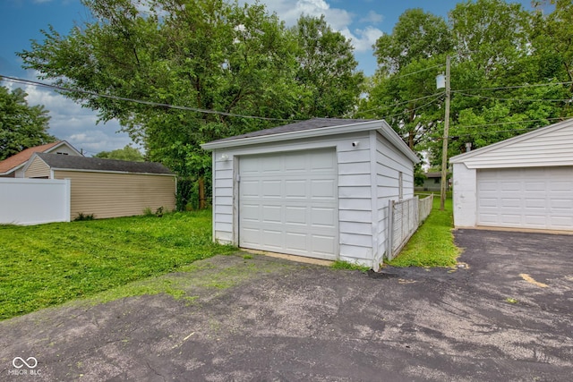 garage featuring a yard