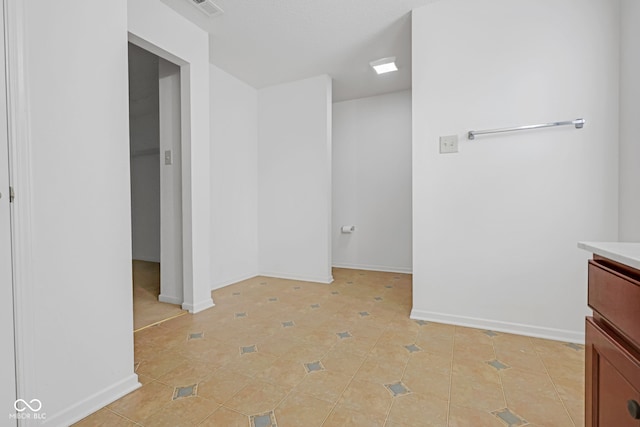 bathroom featuring tile patterned flooring