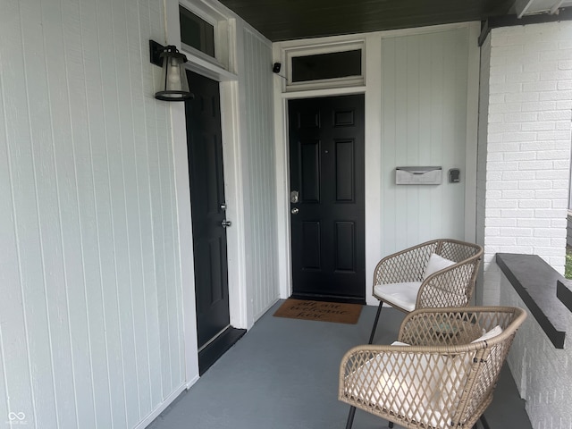 entrance to property with a porch