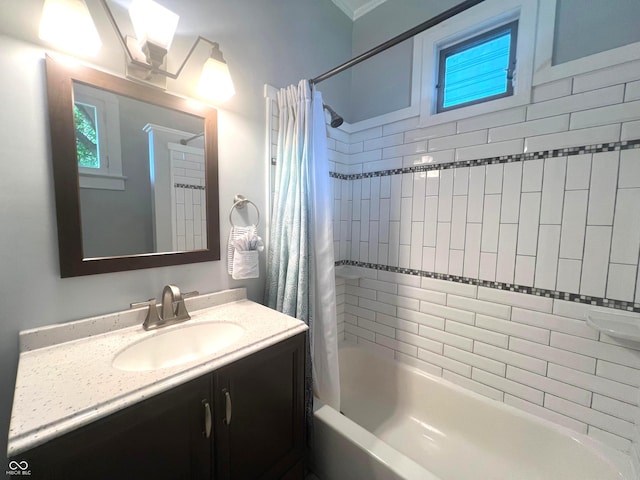 bathroom with shower / bath combination with curtain and vanity