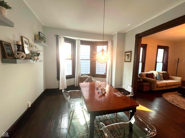 dining area with hardwood / wood-style floors