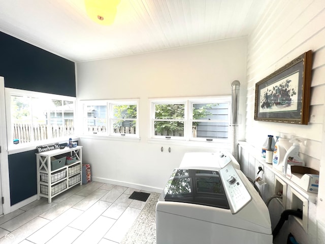 interior space with light hardwood / wood-style flooring and washer and dryer